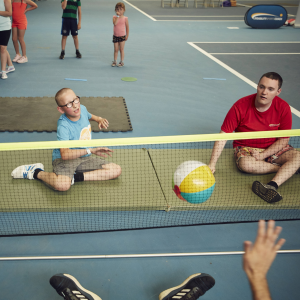 Sitting Volleyball - player taking shot
